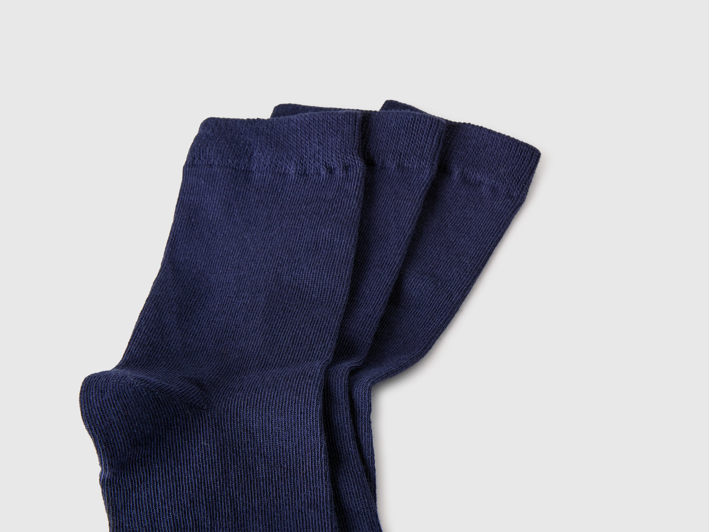 Three pairs of solid-colored medium socks - ucb_image_DS1