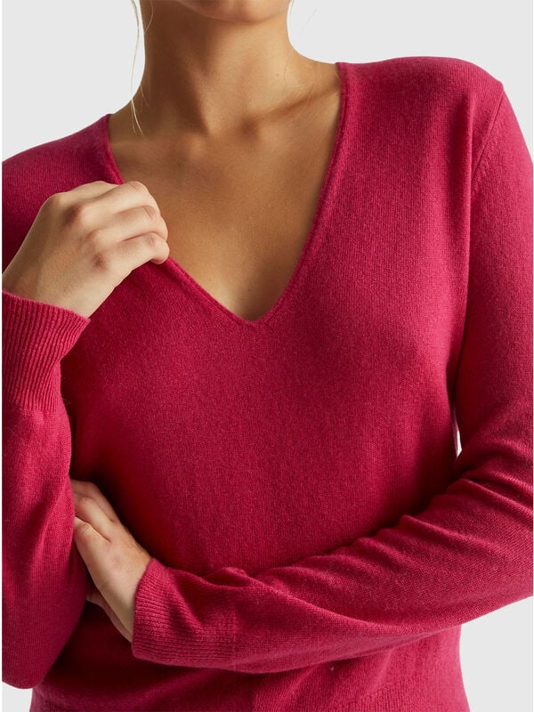Maglione fucsia con scollo a V in pura lana Merino Donna