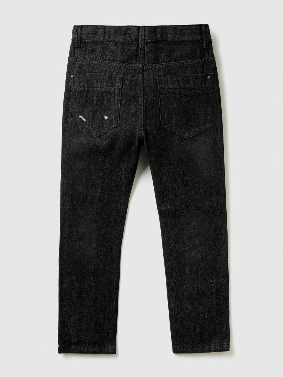 Jeans straight con rotture image number 2