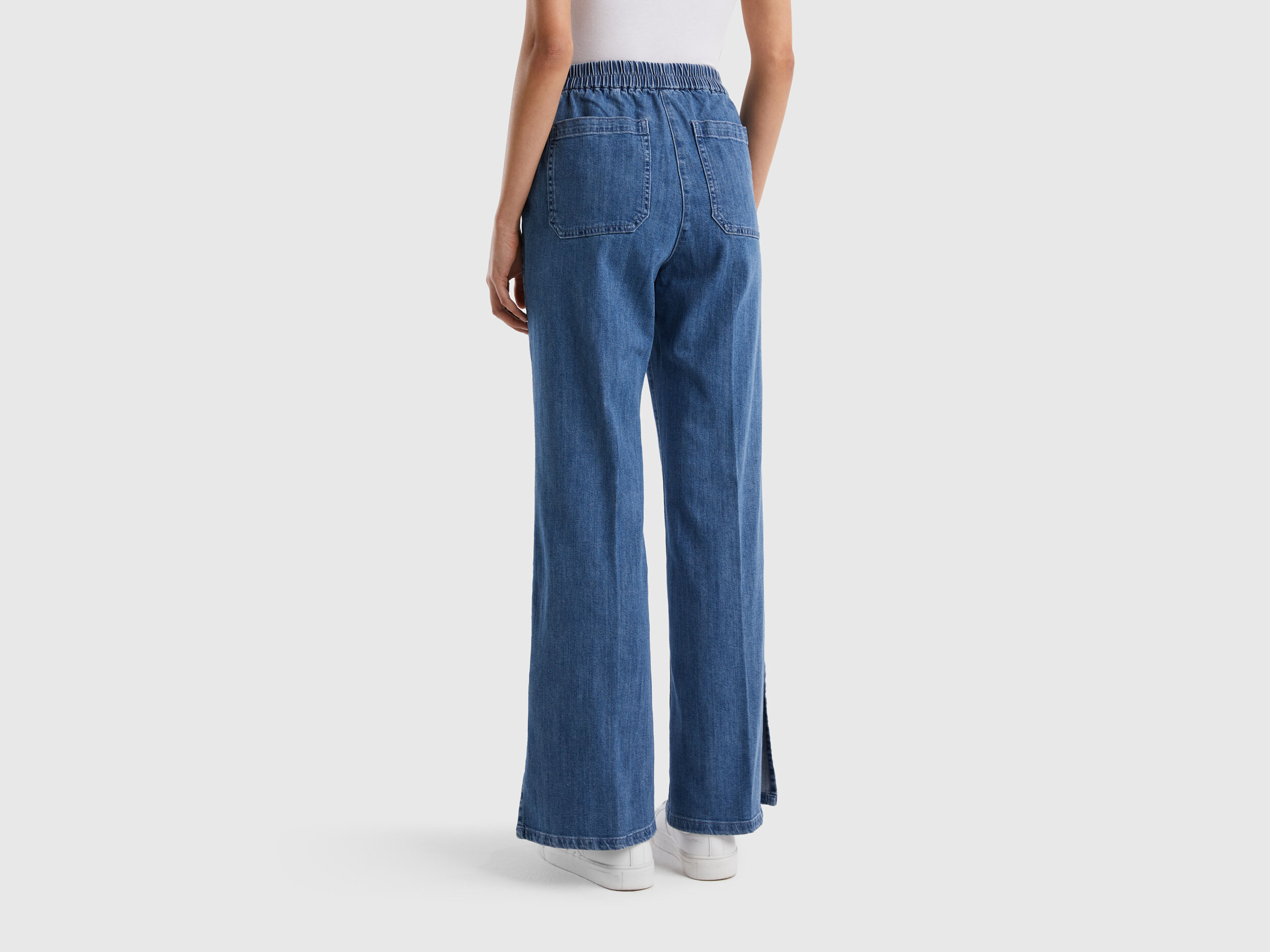 Jeans a zampa con spacchi