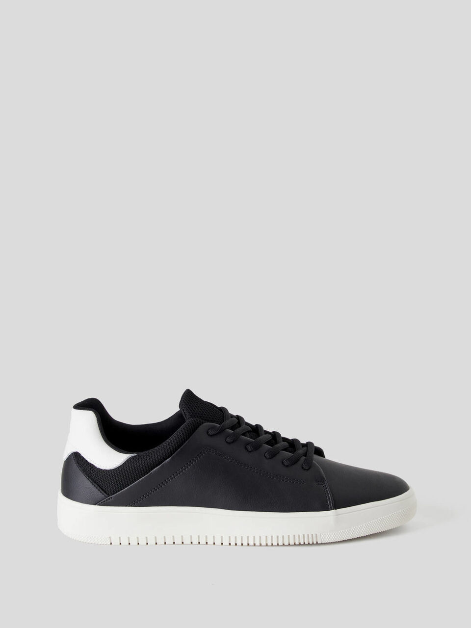 Sneakers in pelle con dettagli in tessuto image number 1