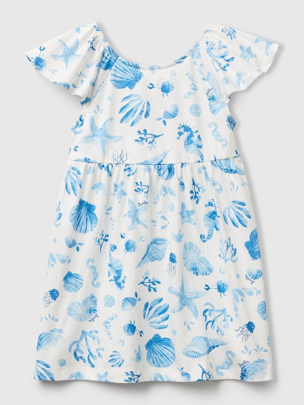 Vestito bianco con conchiglie blu Bambina