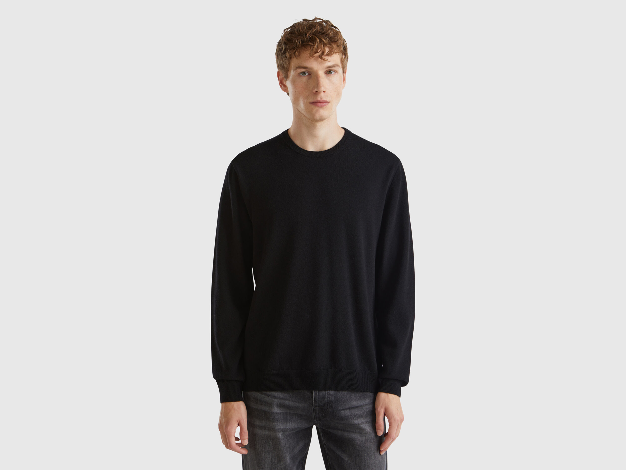 Maglia girocollo nera in pura lana Merino Nero Benetton