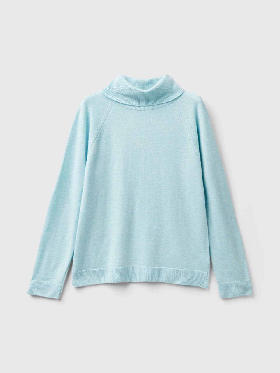 Benetton sale golfini lana