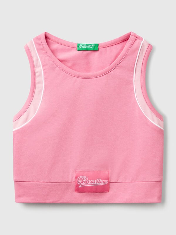Top sportivo con piping Bambina
