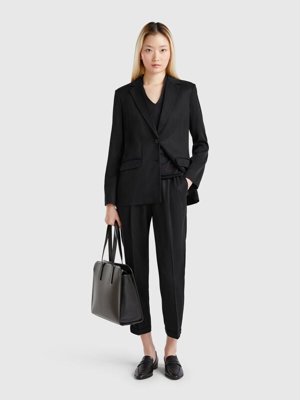 Pantaloni fluidi con risvolto Donna
