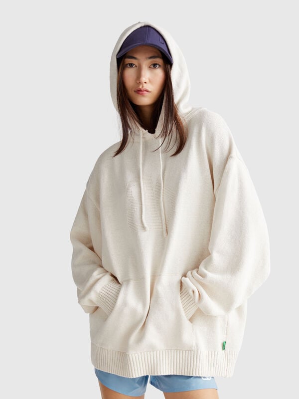 Maglia con tasca e cappuccio Donna