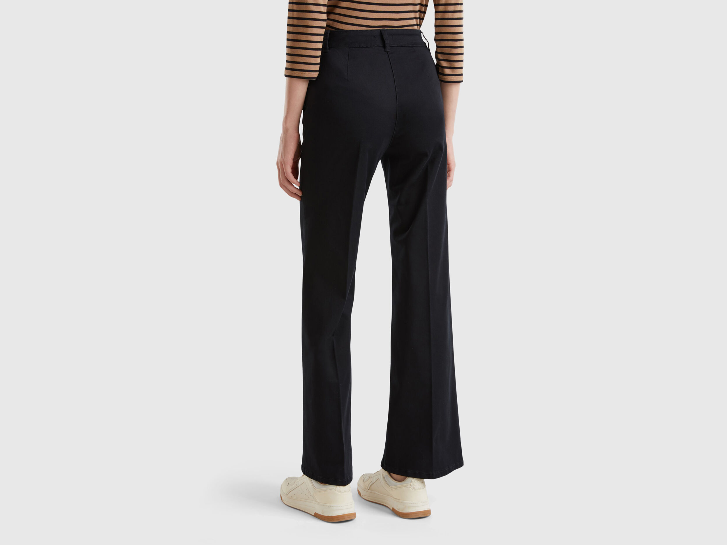 Pantaloni a zampa benetton hot sale
