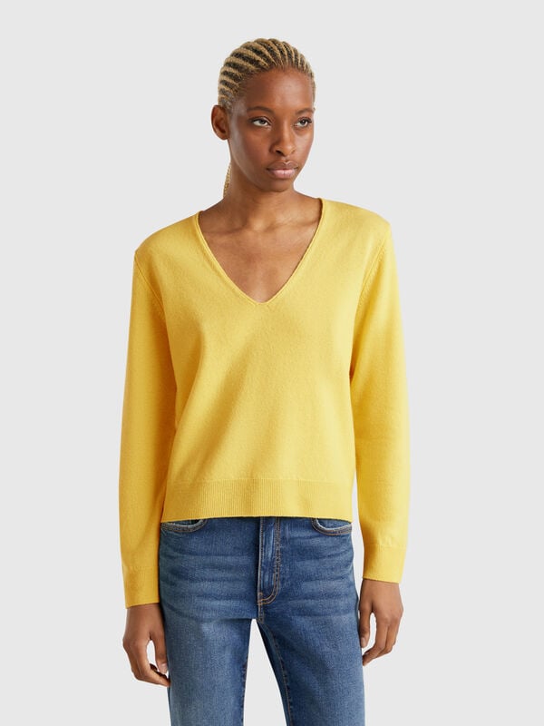 Maglione con scollo a V in pura lana Merino Donna