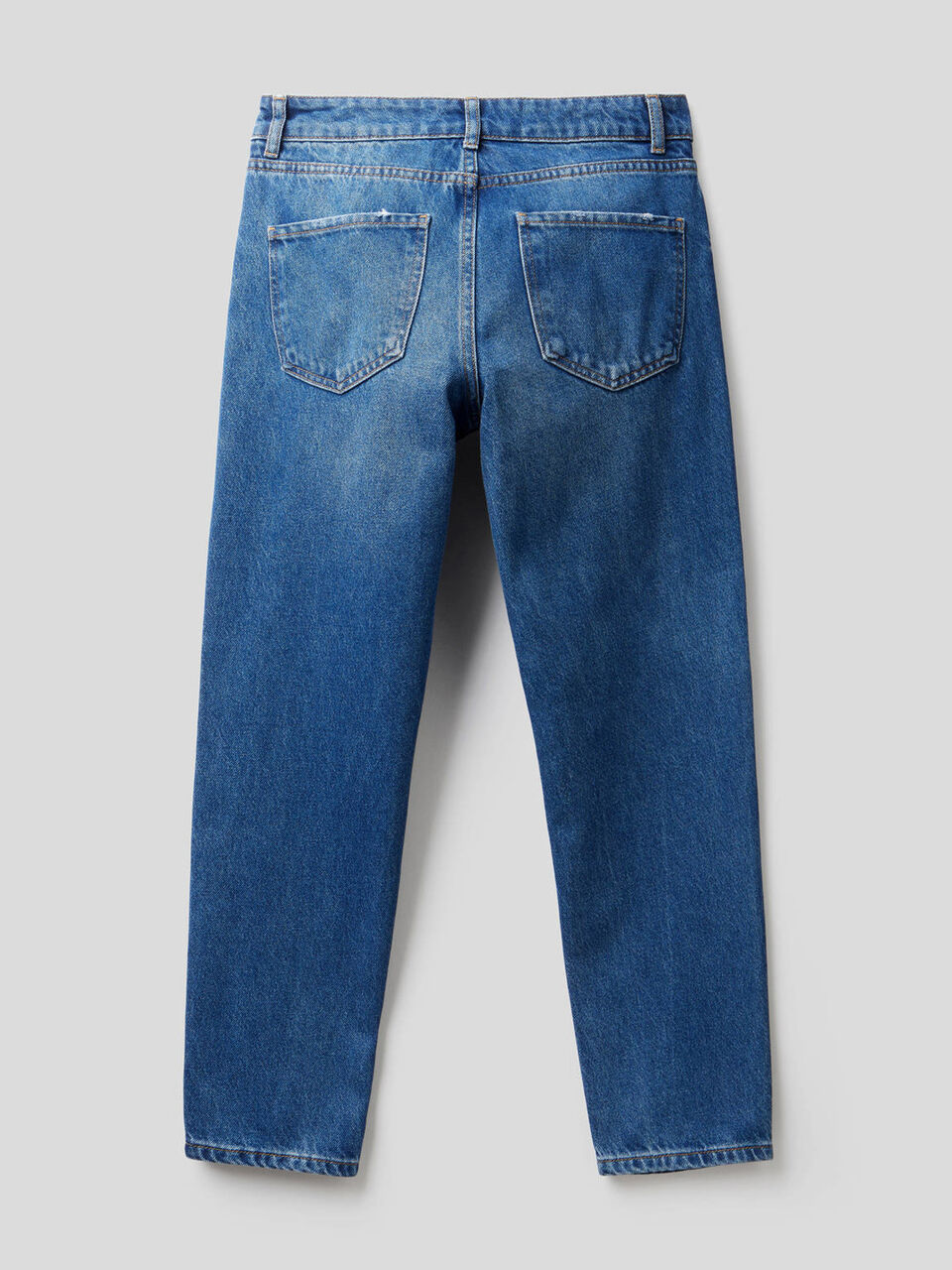 Jeans slim fit con rotture image number 2