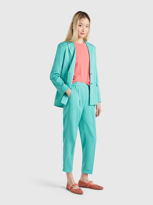 Pantaloni fluidi con risvolto Donna