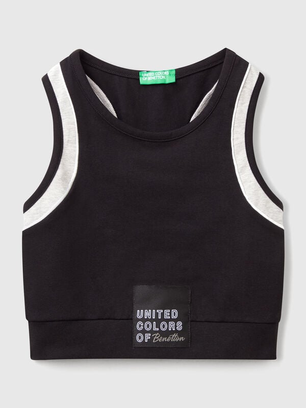 Top sportivo con piping Bambina