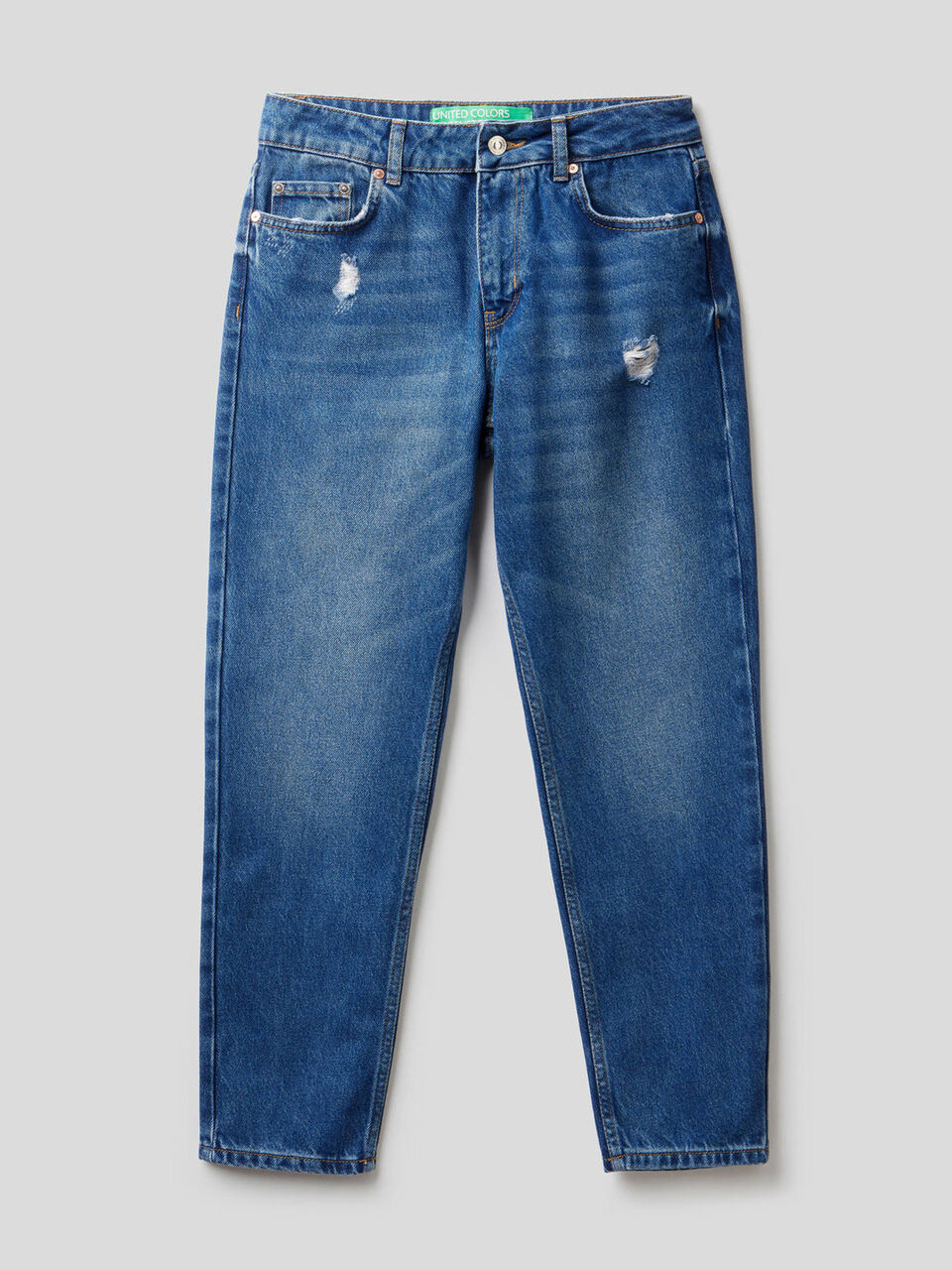 Jeans slim fit con rotture image number 1