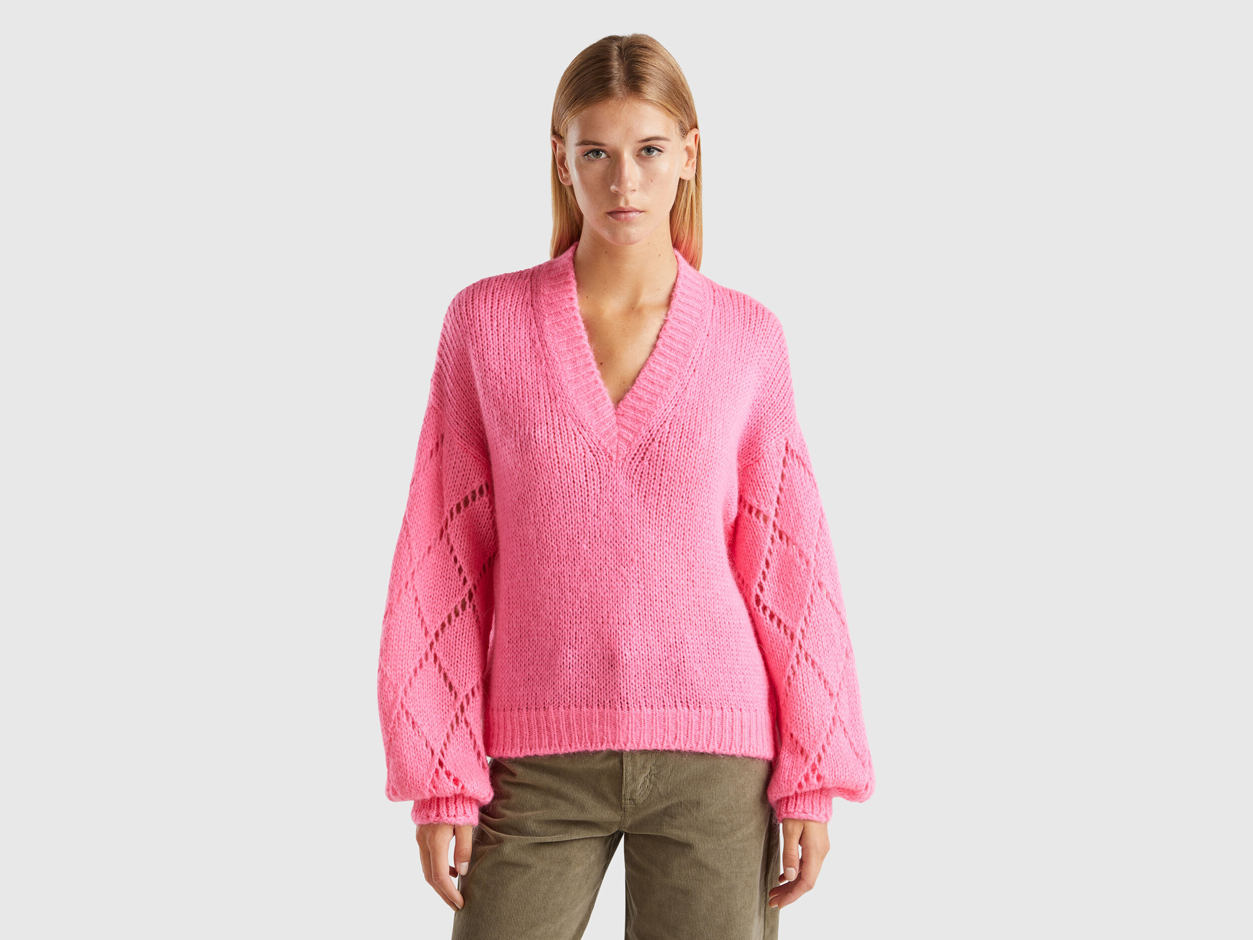 Maglione con manica traforata Rosa Benetton