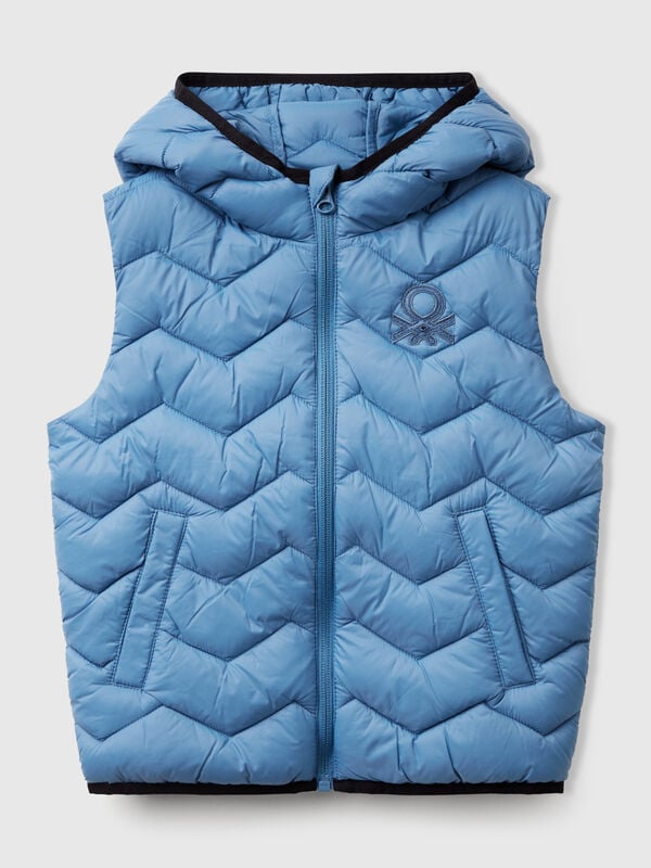 	Gilet imbottito con cappuccio Bambino