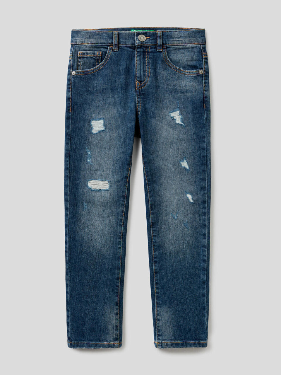 Jeans skinny fit con rotture image number 1