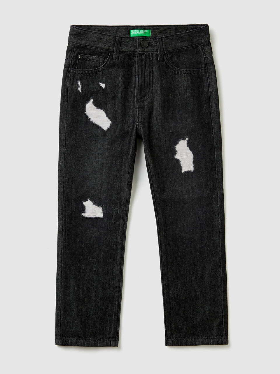 Jeans straight con rotture image number 1
