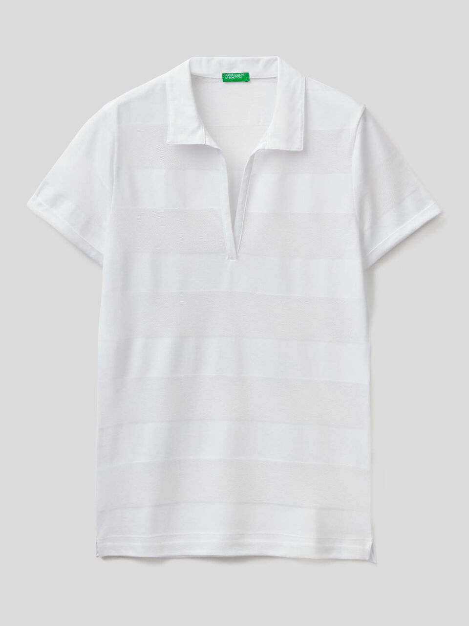 Polo con scollo a V image number 1