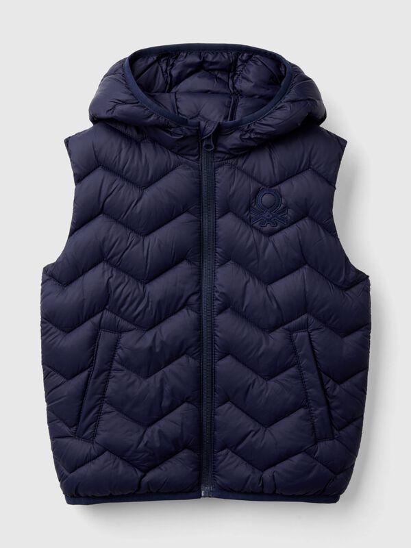 	Gilet imbottito con cappuccio Bambino