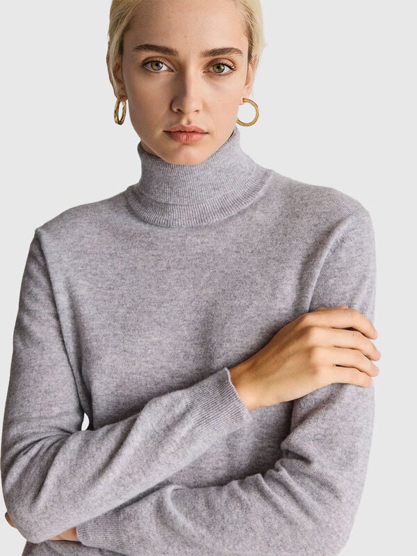 Maglione dolcevita grigio mélange in pura lana Merino Maglione dolcevita grigio mélange in pura lana Merino Donna