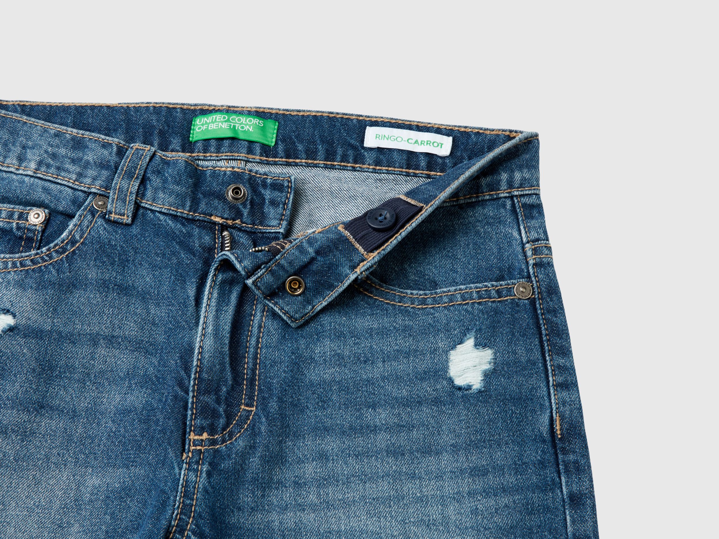 Jeans carrot fit con rotture Blu Benetton