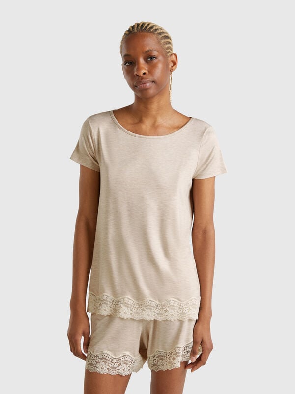 Maglia fluida con bordo in pizzo Donna