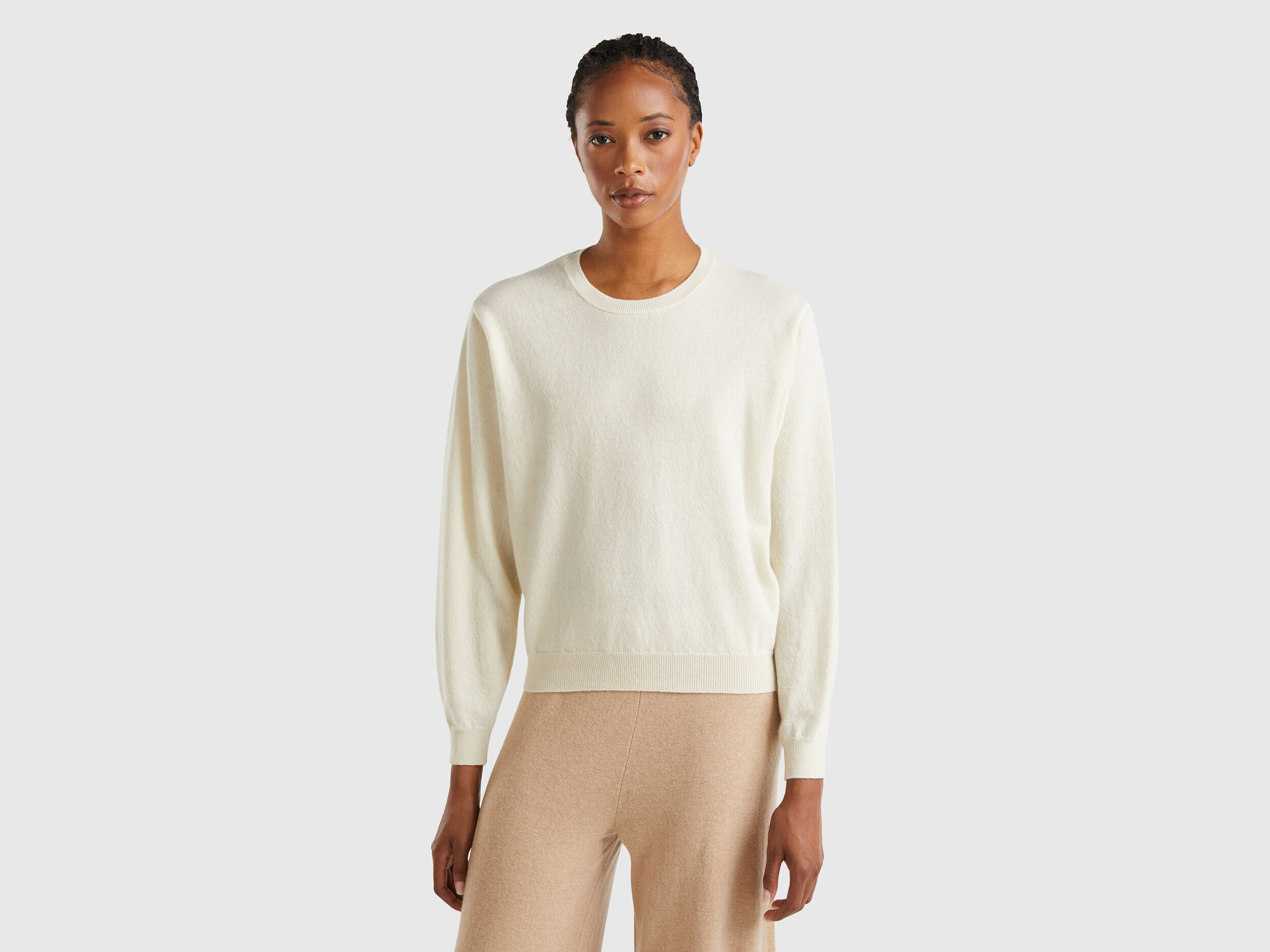 Maglia relaxed fit in pura lana Merino Bianco Panna Benetton