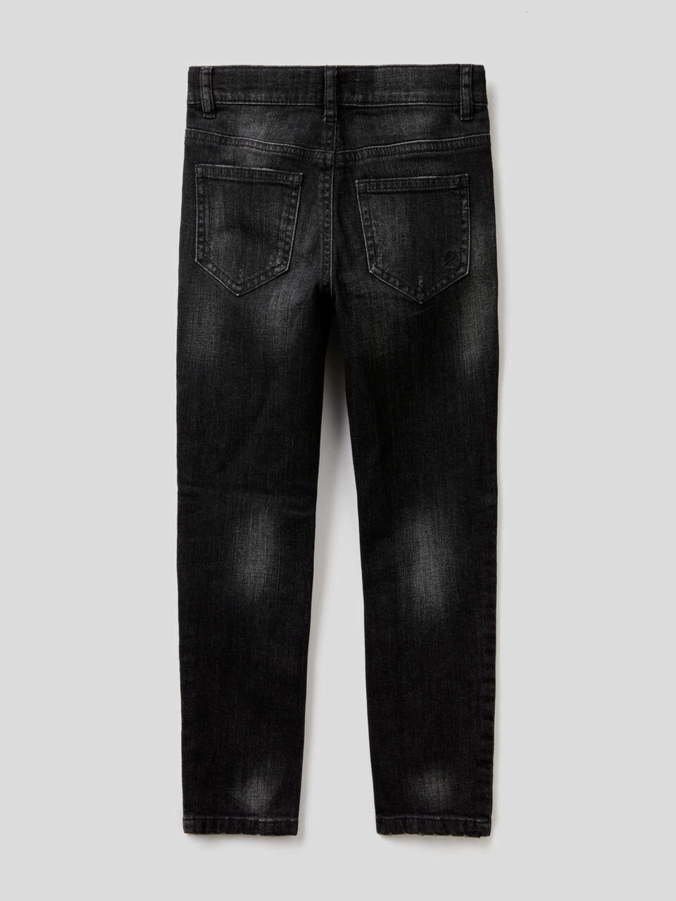 Jeans skinny fit con rotture image number 2