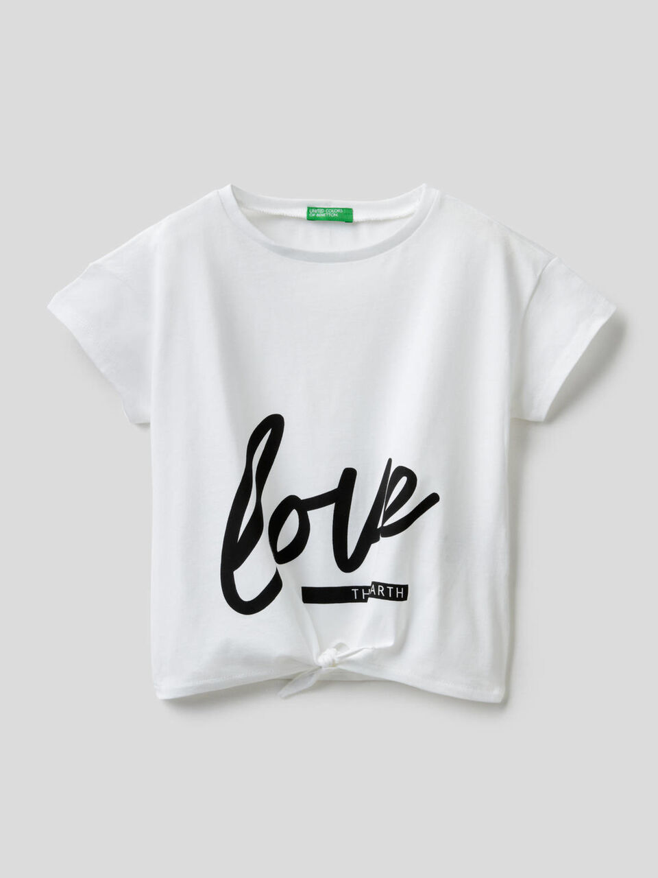 T-shirt con fiocco sul fondo image number 1