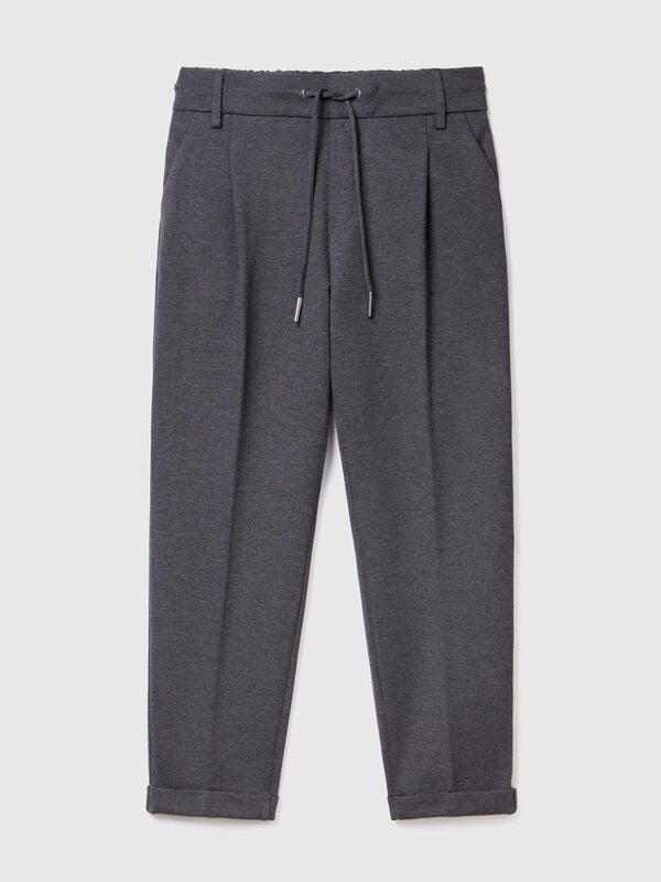 Pantaloni tinta unita con coulisse Pantaloni tinta unita con coulisse Donna