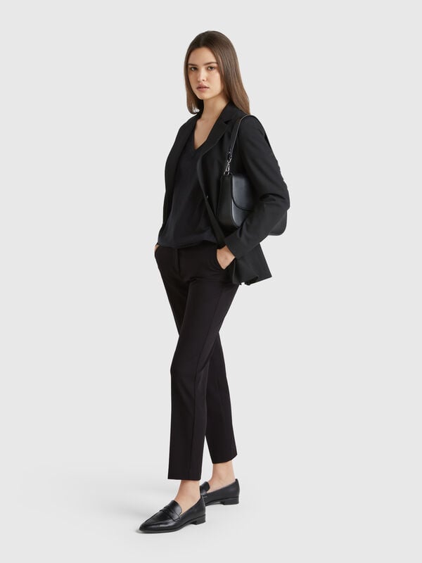 Pantaloni fluidi slim fit Donna