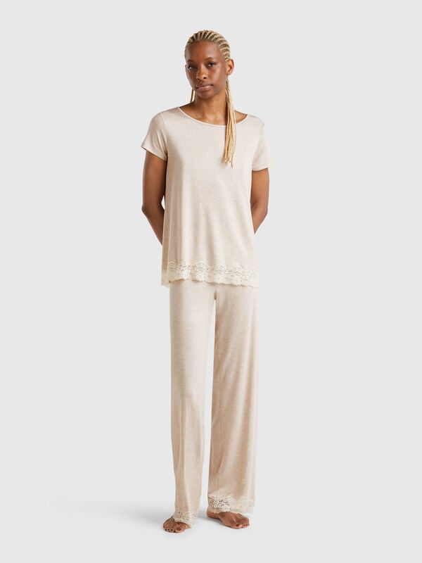 Pantaloni fluidi con pizzo Donna