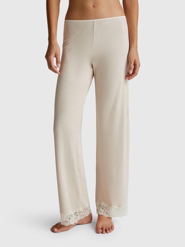 Pantaloni fluidi con pizzo Donna