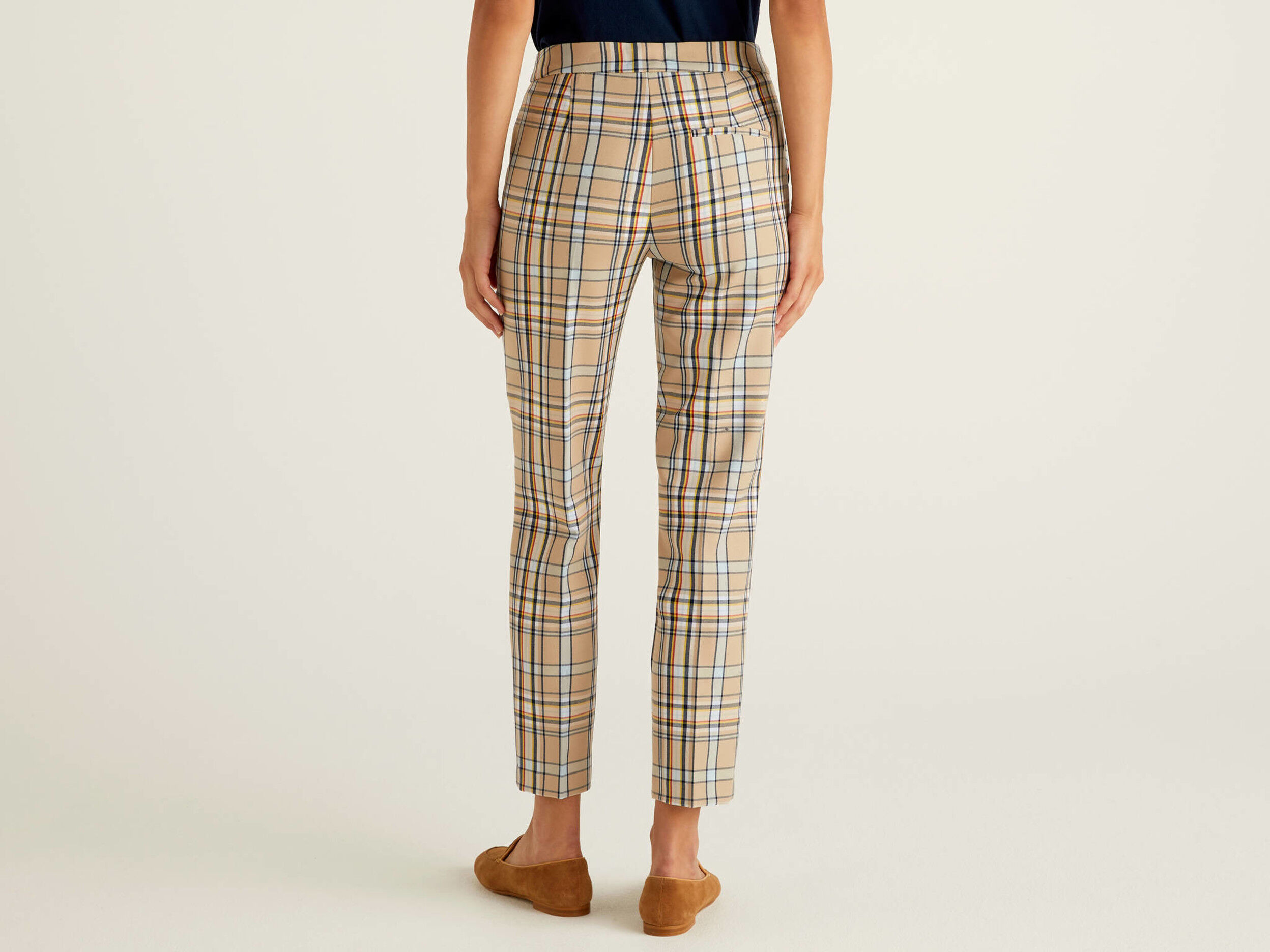 pantaloni a quadri benetton