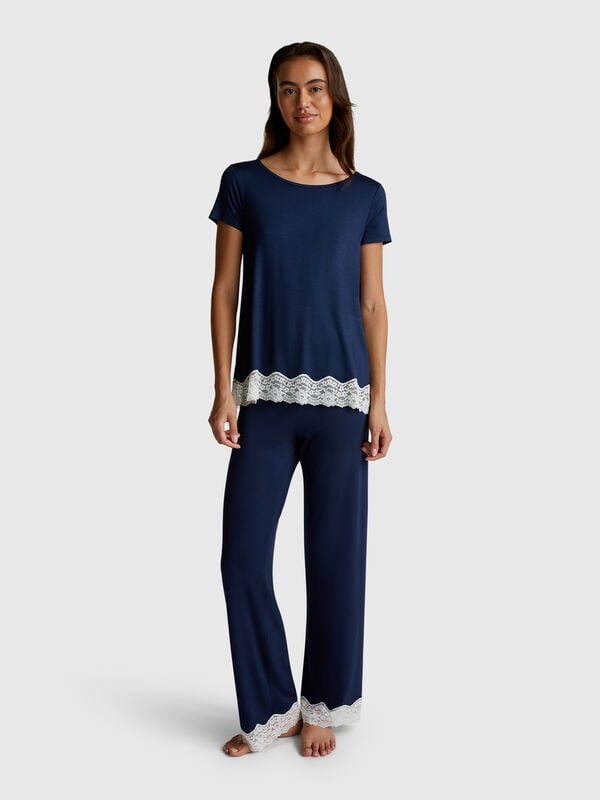 Pantaloni fluidi con pizzo Donna