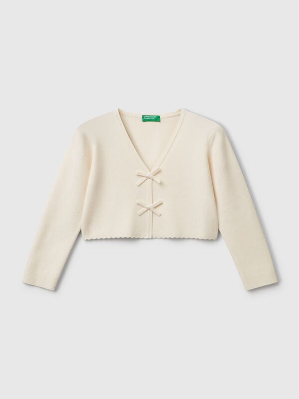 Cardigan con fiocchetti Bambina