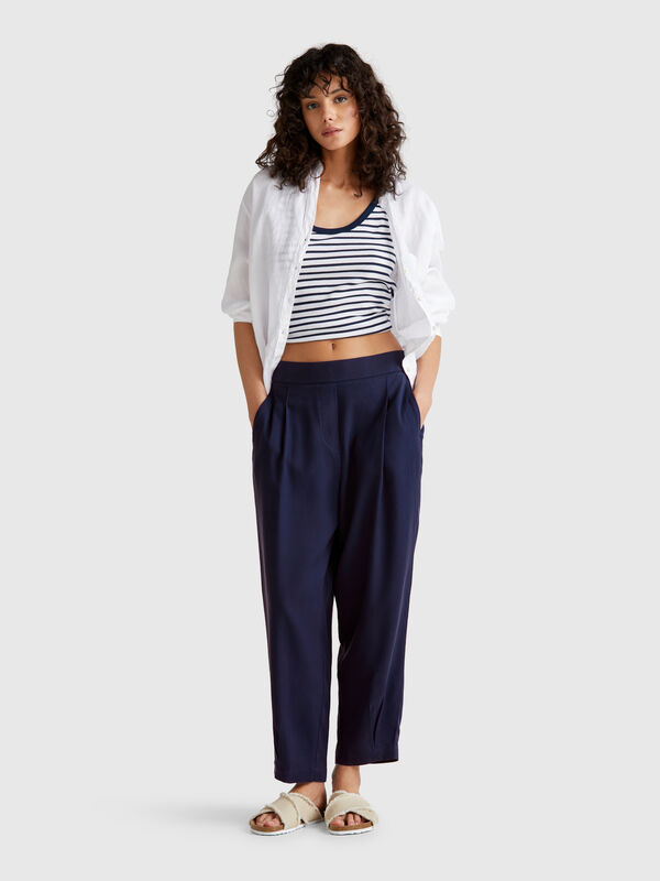 Pantaloni fluidi con pinces Donna