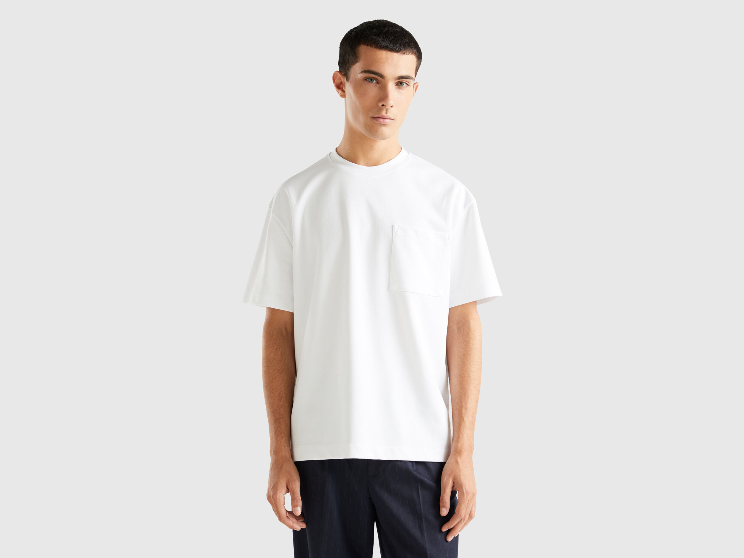 T shirt over fit con taschino Bianco Uomo Benetton