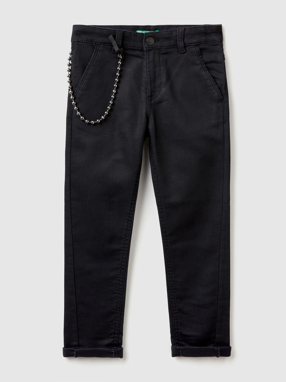 Pantaloni slim fit con catena image number 1