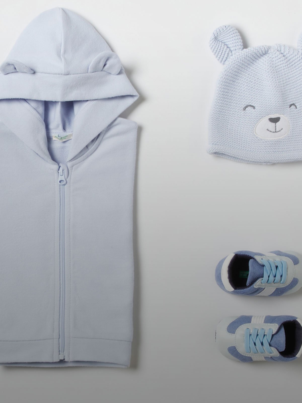 nuova collezione <span class="text-l playful">baby</span> benetton