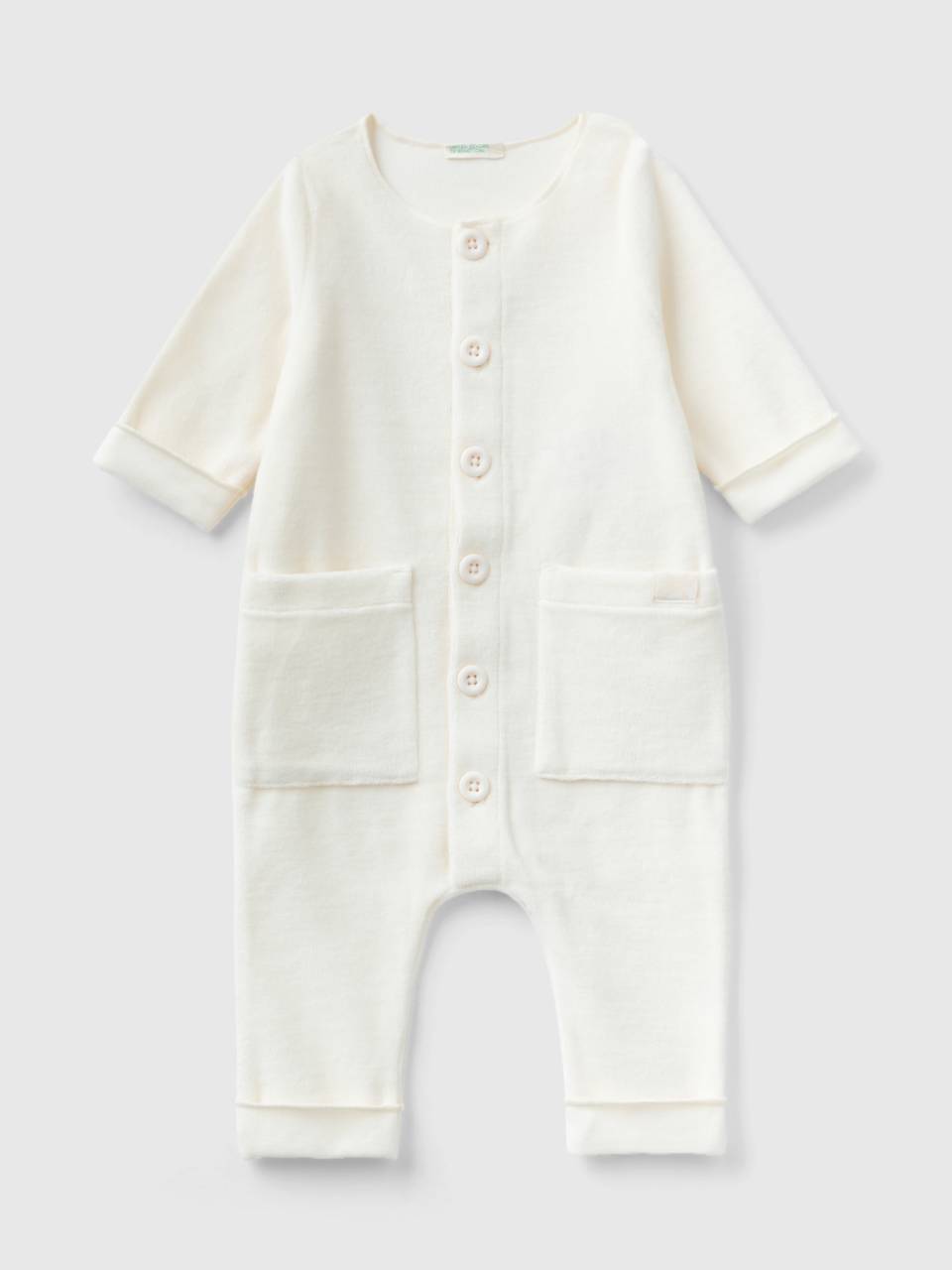 Tutina in ciniglia con taschini Bianco Panna Neonato Benetton